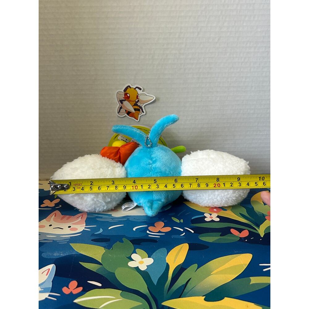 Pokemon Center Mega Tokyo Swablu Plush Keychain Holding Flower NWT - Picture 3 of 13